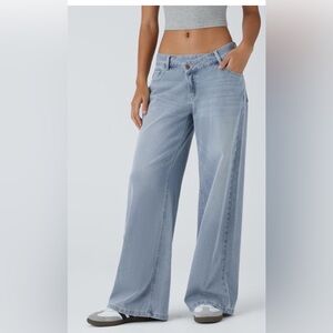 Halara Wide Leg Asymmetric low rise waist jeans. New with tags. Women’s XS